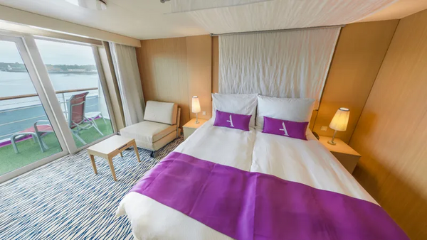 Ambassador Cruise Line Ambition Balcony Cabin Bed.png